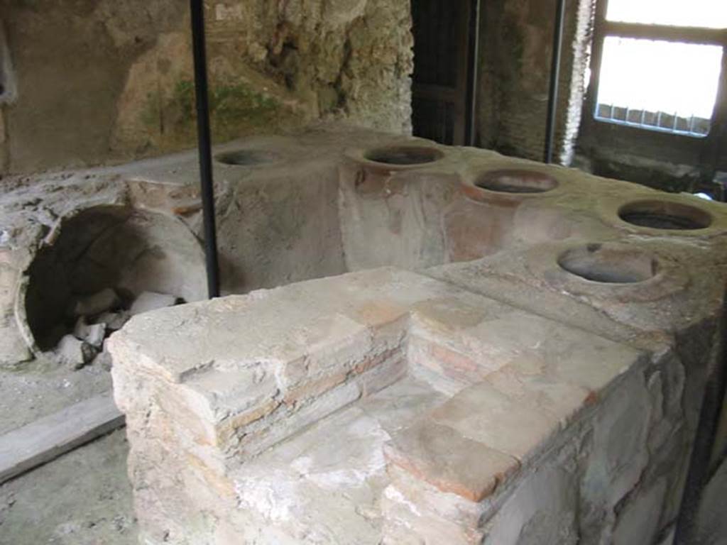 I.8.15 Pompeii. May 2003. Looking south-east across rear of bar counter. Photo courtesy of Nicolas Monteix.