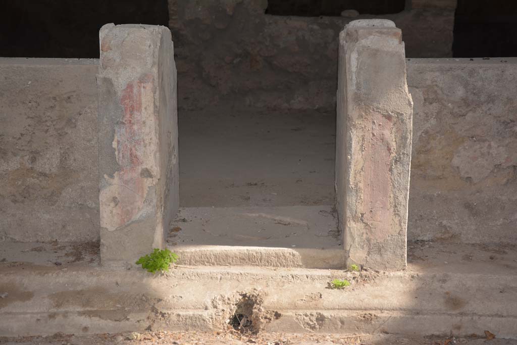  
I.8.17 Pompeii. March 2019. Atrium 3, looking east towards table-legs with remaining painted decoration. 
Foto Annette Haug, ERC Grant 681269 DÉCOR.
According to PPM – on each of these table-legs was a painting of a herm. 
See Carratelli, G. P., 1990-2003. Pompei: Pitture e Mosaici. I. Roma: Istituto della enciclopedia italiana, (p.852.)
