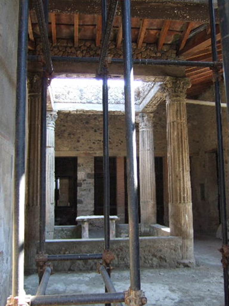 I.8.17 Pompeii. September 2005. Room 3.
Atrium showing table top on east side of impluvium. 

