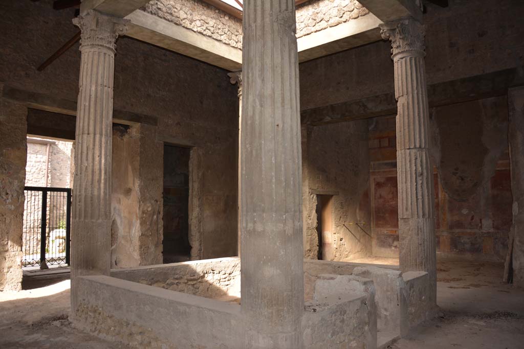I.8.17 Pompeii. March 2019. 
Room 3, atrium, looking north-west across impluvium towards entrance doorway, doorway to rooms 15, 14 and 13. 
Foto Annette Haug, ERC Grant 681269 DÉCOR.

