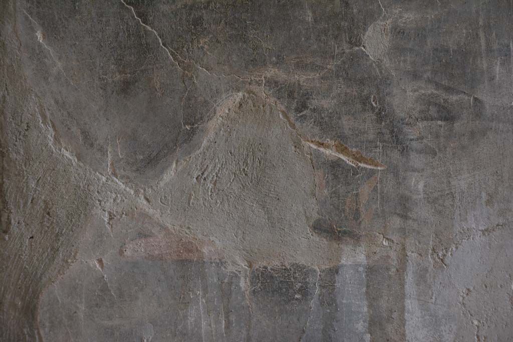 I.8.17 Pompeii. March 2019. Room 7, detail of remaining painted bird from centre of black side panel on west wall at north end.   
Foto Annette Haug, ERC Grant 681269 DÉCOR.
