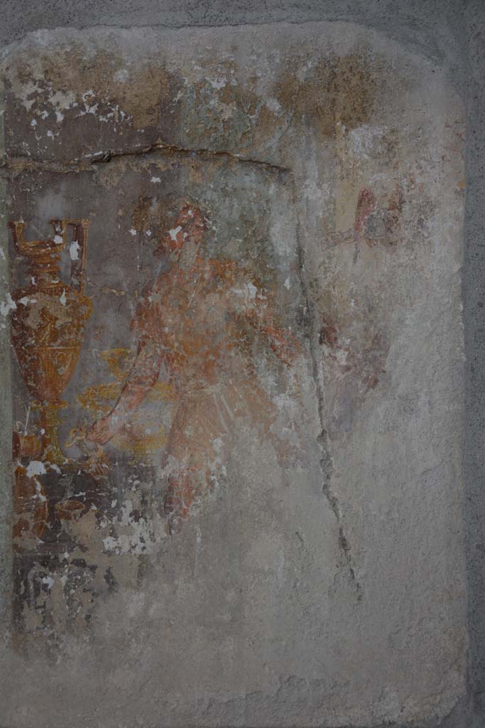 I.8.17 Pompeii. March 2019. 
Room 9, detail of figure from west side of central wall painting on north wall.
Foto Annette Haug, ERC Grant 681269 DÉCOR.
