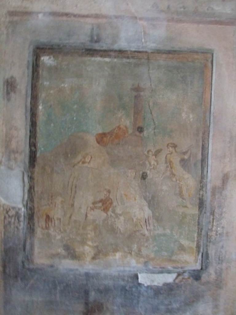 I.8.17 Pompeii. December 2007. Room 9, south wall. Wall painting of the Judgement of Paris. According to Peters, this mythological shows the judgement of Paris in landscape surroundings. The three goddesses are sitting against a hill together with a cupid. They can be admired by the spectators of the painting but not by Paris, who is in the left foreground with Hermes, and cannot see them. See Peters, W.J.T. (1963): Landscape in Romano-Campanian Mural Paintings.The Netherland, Van Gorcum & Comp. (p.105)
