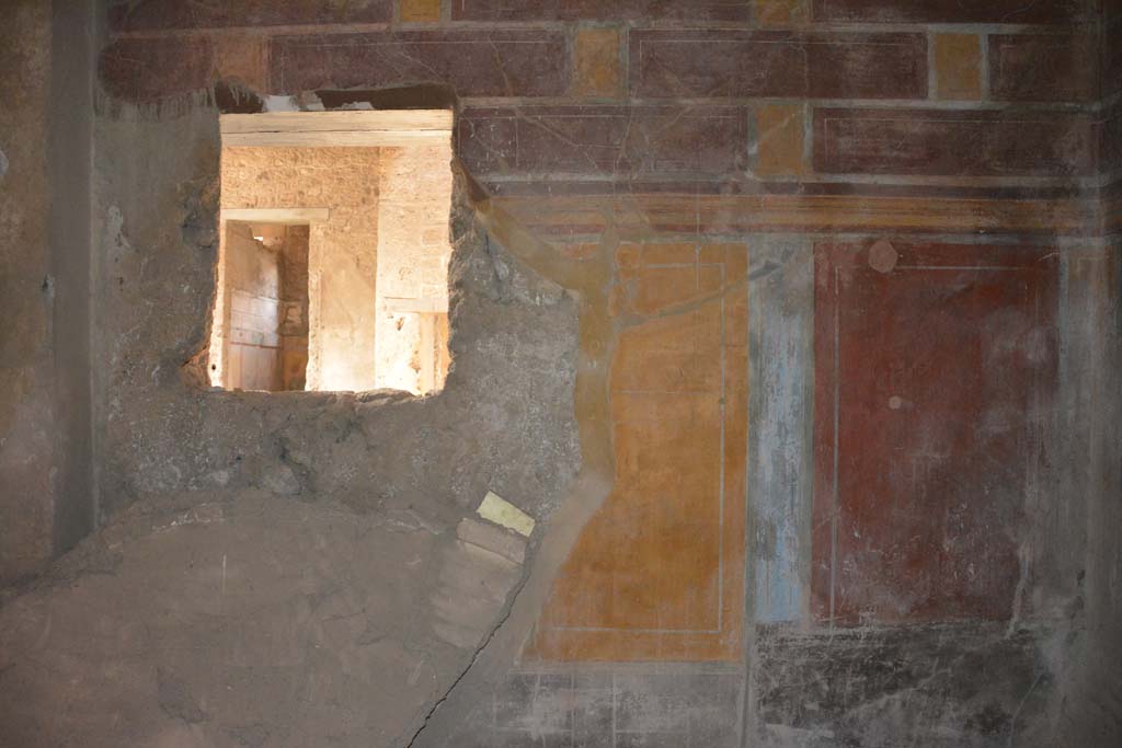 I.8.17 Pompeii. March 2019. Room 12, west wall with window overlooking north ala 13.
Foto Annette Haug, ERC Grant 681269 DÉCOR.
