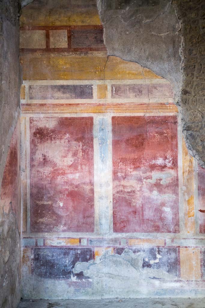I.8.17 Pompeii. December 2021. 
Room 13, detail of west end of north wall. Photo courtesy of Johannes Eber.
