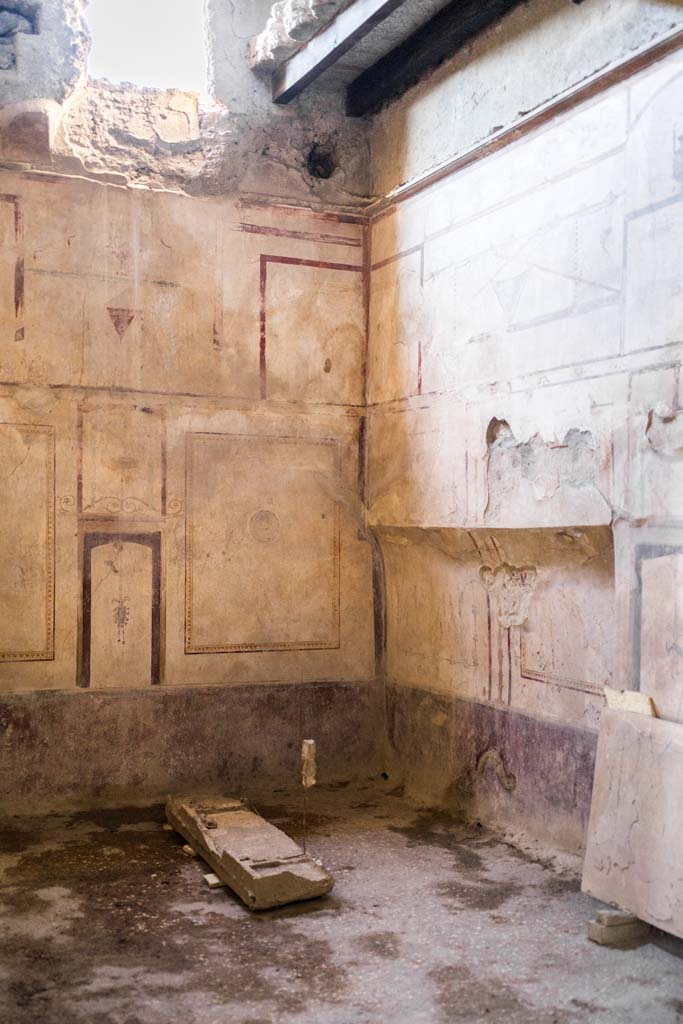 I.8.17 Pompeii. December 2021. 
Room 14, looking towards north-west corner with recess in north wall. Photo courtesy of Johannes Eber.


