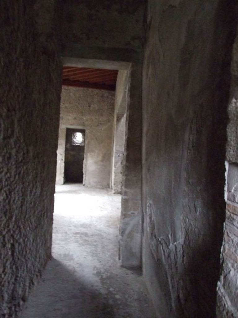 I.8.17 Pompeii. December 2007. Room 11, corridor looking west to atrium 3.