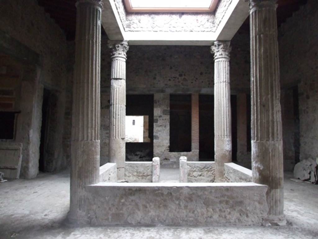I.8.17 Pompeii. December 2007. Room 3, atrium and impluvium. Looking east from entrance.