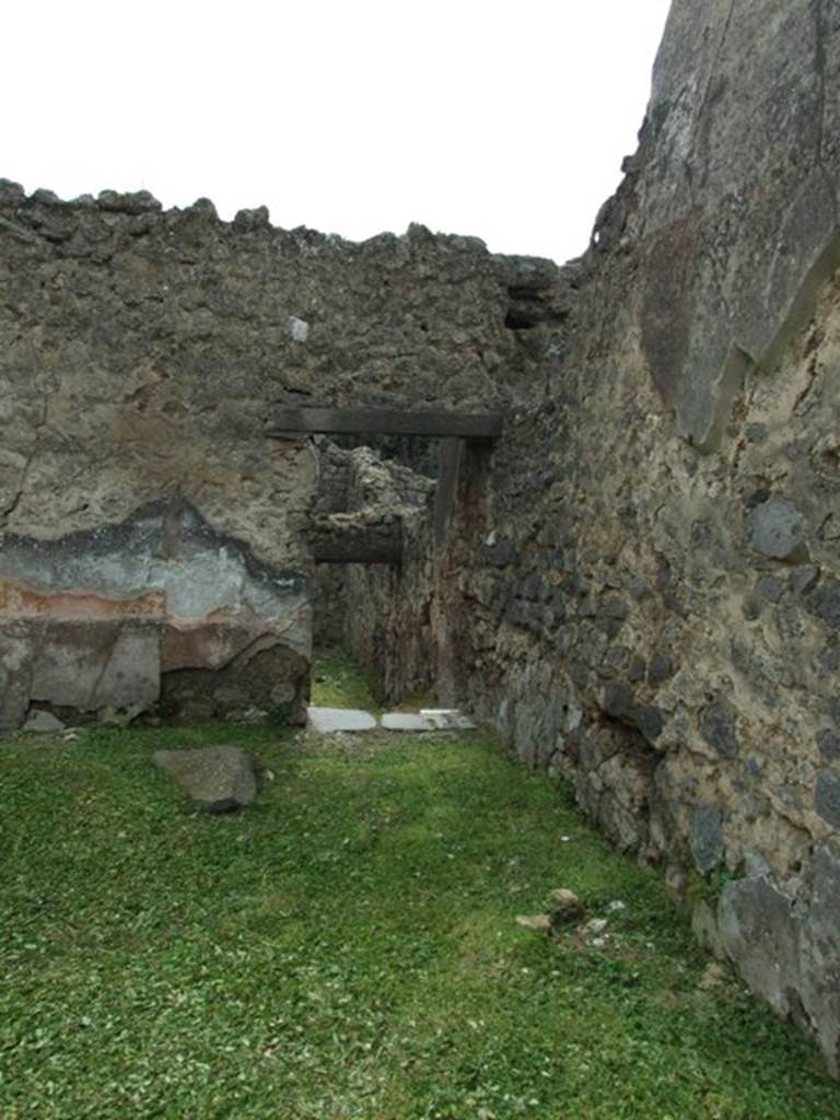 I.9.3 Pompeii. March 2009.  Doorway  in south west corner of garden to room 7.