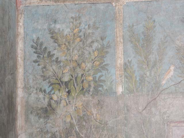 I.9.5 Pompeii, May 2018. 
Room 5, central zone, in a garden painting, painted marble relief (stylopinakion) of Dionysus and Maenad from east wall. 
Photo courtesy of Buzz Ferebee.
