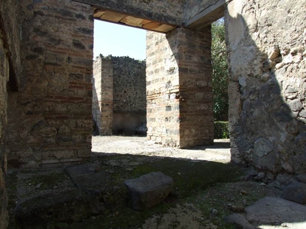 I.9.5 Pompeii. March 2009. Room 15. Kitchen.  Looking north west towards doorways to Triclinium and Peristyle.
