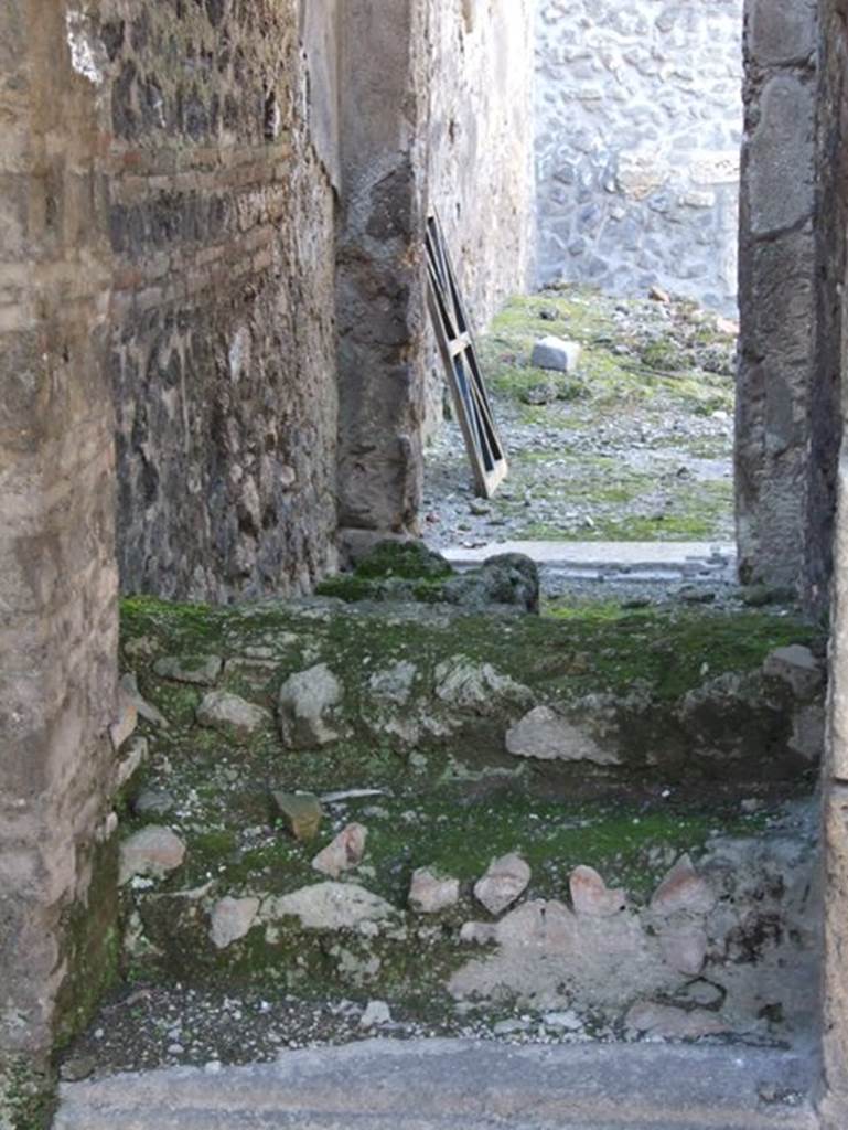 I.9.5 Pompeii. May 2017. Room 8, looking north to rear of the fragments of wall frescoed in II Style, fallen and found in the tablinum, also see Part 4. Photo courtesy of Buzz Ferebee.
