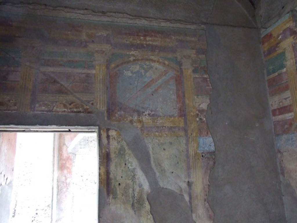 I.9.14 Pompeii. March 2009. Room 7,  architectural painting from upper part of east wall.