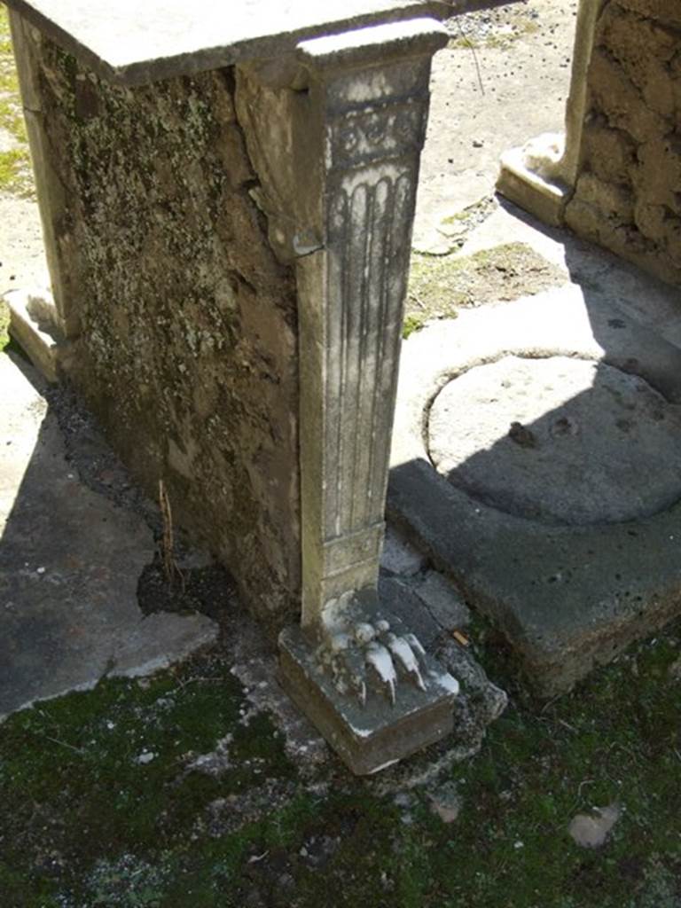 I.10.7 Pompeii. March 2009.  Detail of table leg in north-east corner.