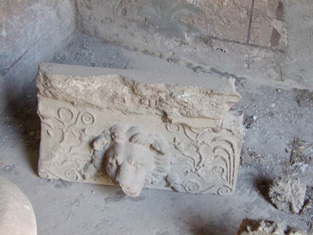I.10.7 Pompeii. March 2009.   Room 3.   Cubiculum. Remains of a Lion. Grondaia or antefisse fittili  (rainwater spouts for gutters).