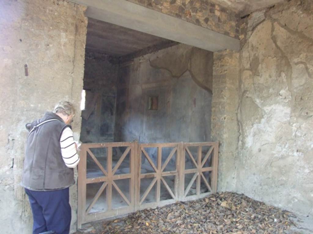 I.10.7 Pompeii. March 2009.  Doorway to room 12 in the north wall of the portico.