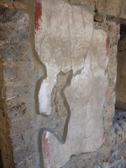 I.10.11 Pompeii. March 2009. Room 10, east wall of peristyle, between doorway and window of room 11.  Site of graffiti?   