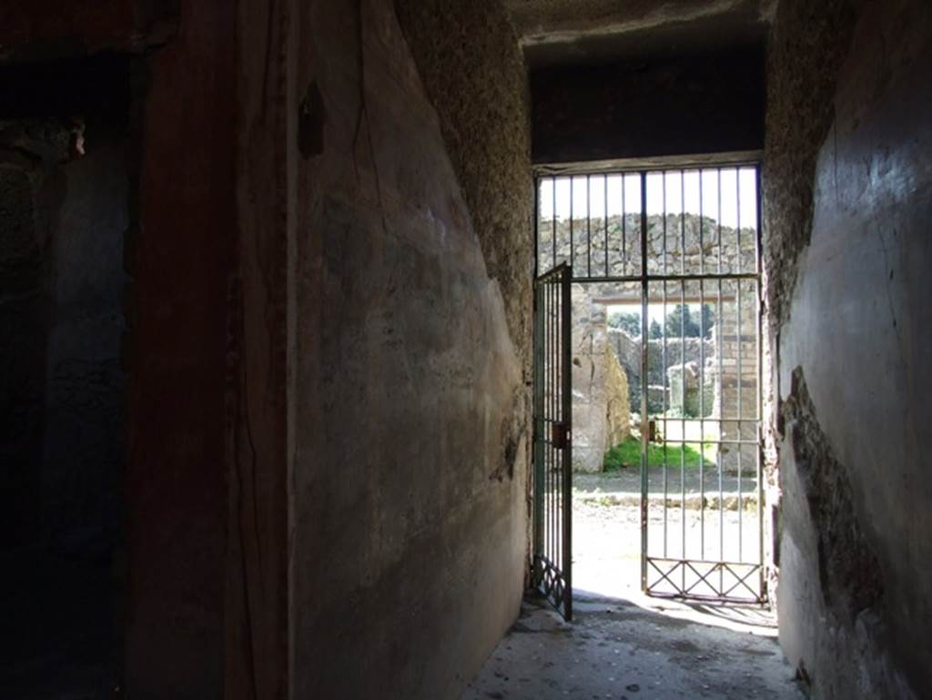 I.10.11 Pompeii. March 2009. Room 1, south wall of fauces or entrance corridor. Looking west. 