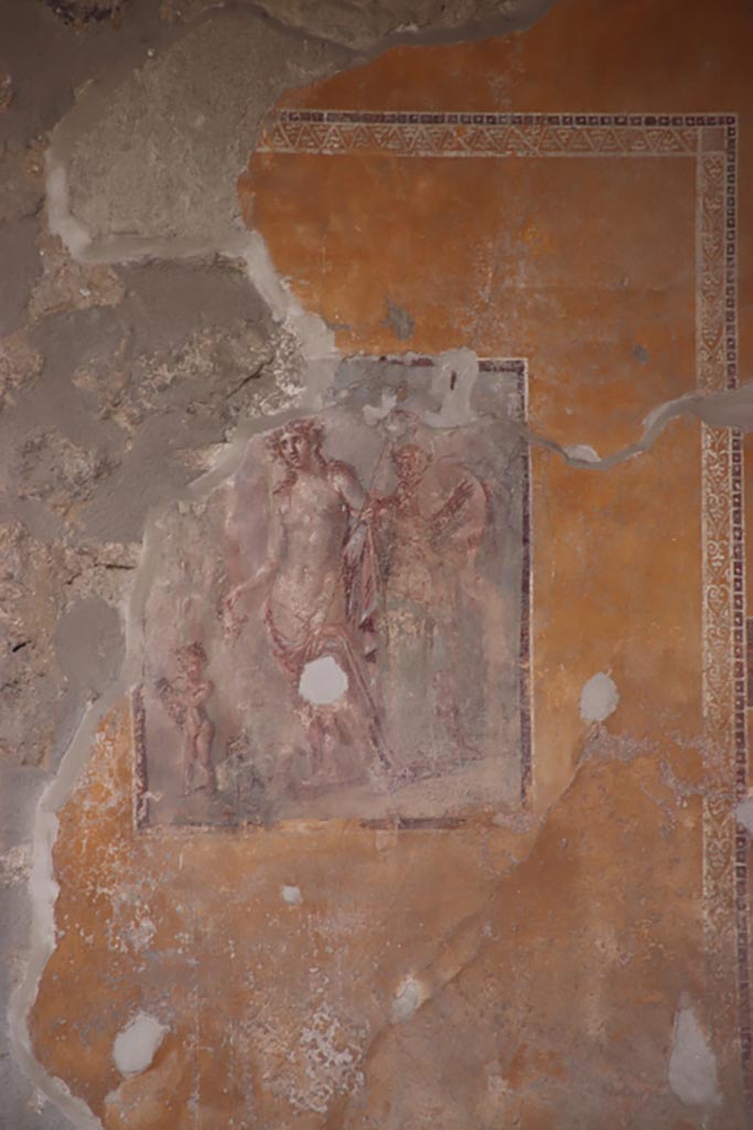 I.11.6 Pompeii. May 2024. Room 5, south wall of tablinum. 
Wall painting of Dionysus/Bacchus with Silenus, tambourine and satyr. Photo courtesy of Klaus Heese.

