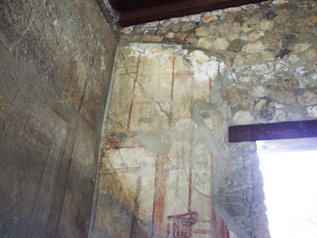 I.12.2 and I.12.1 Pompeii. March 2009. 
Room 7, triclinium. North wall, west side. Painted decoration.
