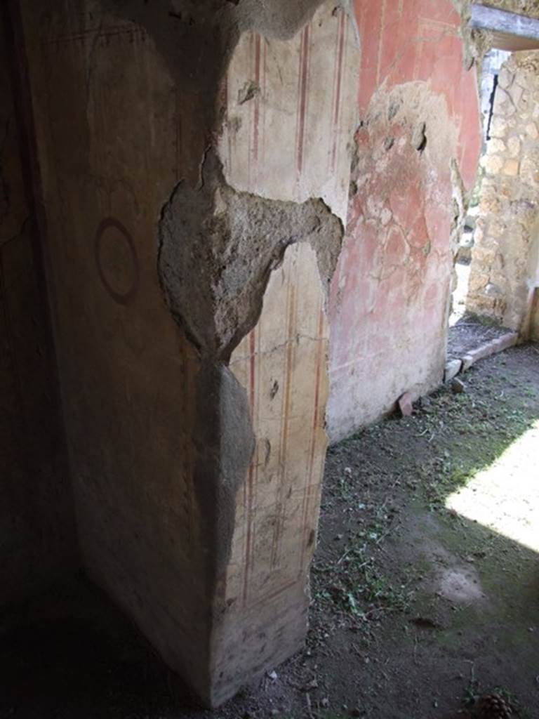 I.12.2 and I.12.1 Pompeii.  March 2009.  Room 9.  South east door pillar, and East wall of portico with door to room 11.