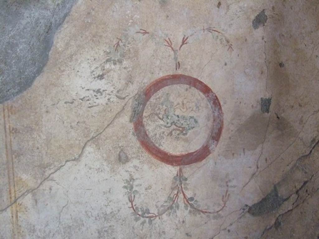I.12.2 and I.12.1 Pompeii. March 2009. Room 9, painted medallion of four-footed animal from south end of east wall.