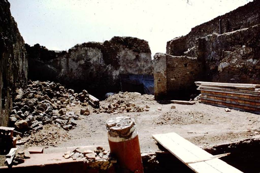 I.12.2 and I.12.1 Pompeii. 1961.  Room 8, portico.  Looking south across portico to garden area, shortly after excavation. Photo by Stanley A. Jashemski.
Source: The Wilhelmina and Stanley A. Jashemski archive in the University of Maryland Library, Special Collections (See collection page) and made available under the Creative Commons Attribution-Non Commercial License v.4. See Licence and use details.
J61f0242
