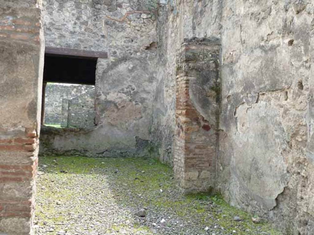 I.12.1 and I.12.2 Pompeii.  Room 2, south wall with window, south-west corner and west wall.