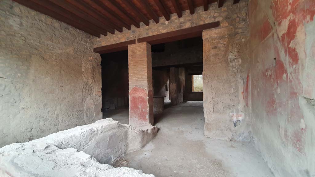 I.12.3, Pompeii. August 2021. Room 1, looking south towards rear rooms. Photo courtesy of Robert Hanson.