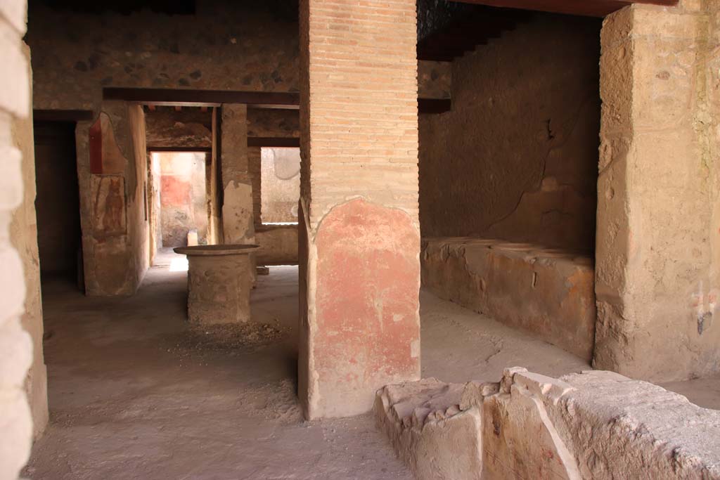 I.12.3 Pompeii, May 2018. Room 1, counter leaning against west wall of courtyard. Photo courtesy of Buzz Ferebee.
