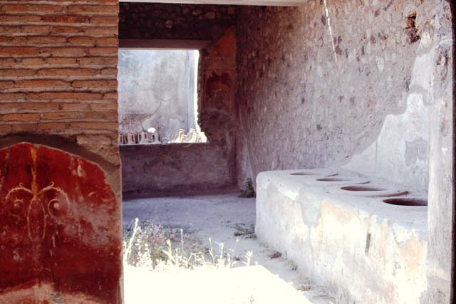 I.12.3 Pompeii.  March 2009. Doorway to room 4. Kitchen.