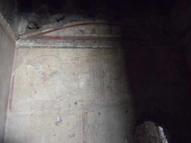 I.12.3 Pompeii.  March 2009.  South east corner of painted upper wall of passageway.