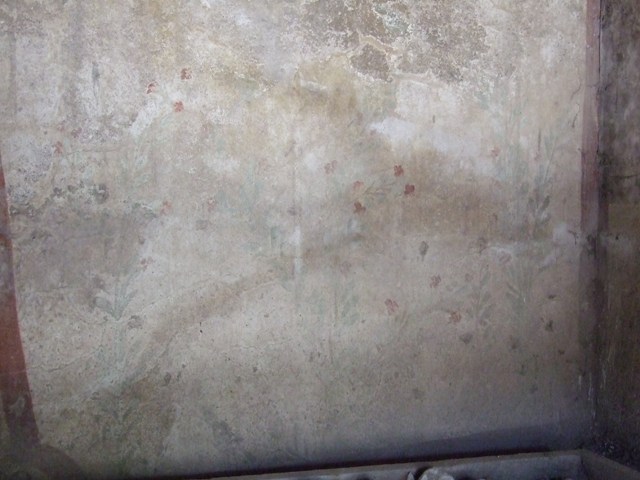 I.12.8 Pompeii.  March 2009. Room 10.  West wall. On the upper west wall was a round altar with a Genius flanked by two Lares with a Rhyton and a Patera.  On the lower west wall were a garland with painted plants and birds underneath.  See Fr�hlich, T., 1991. Lararien und Fassadenbilder in den Vesuvst�dten. Mainz: von Zabern. (L26, T:26,1).