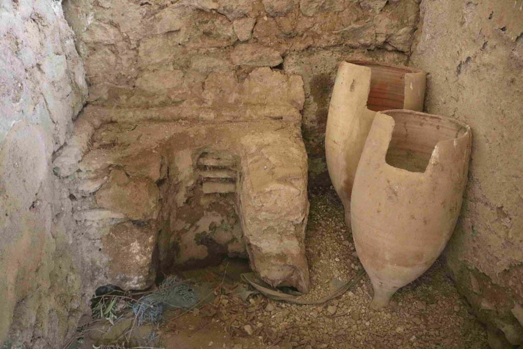 I.12.8 Pompeii. December 2018. Room 12, detail of latrine against east wall. Photo courtesy of Aude Durand.