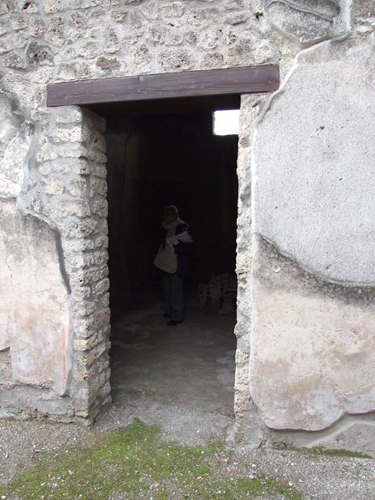 I.12.11 Pompeii.  ecember 2007. Doorway to triclinium on the west side of the tablinum area.