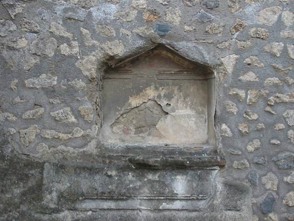I.12.12 Pompeii. May 2003. Detail of niche lararium in west wall. Photo courtesy of Nicolas Monteix.