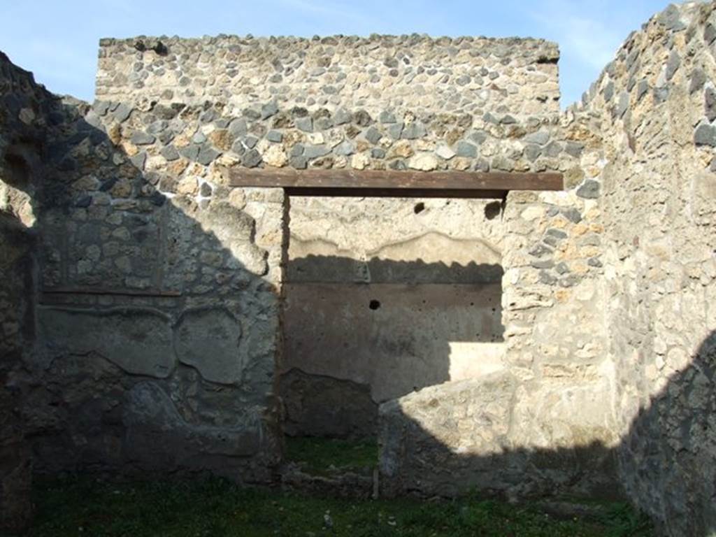 I.12.12 Pompeii. December 2007. North wall containing doorway and window to rear room at I.12.13.
