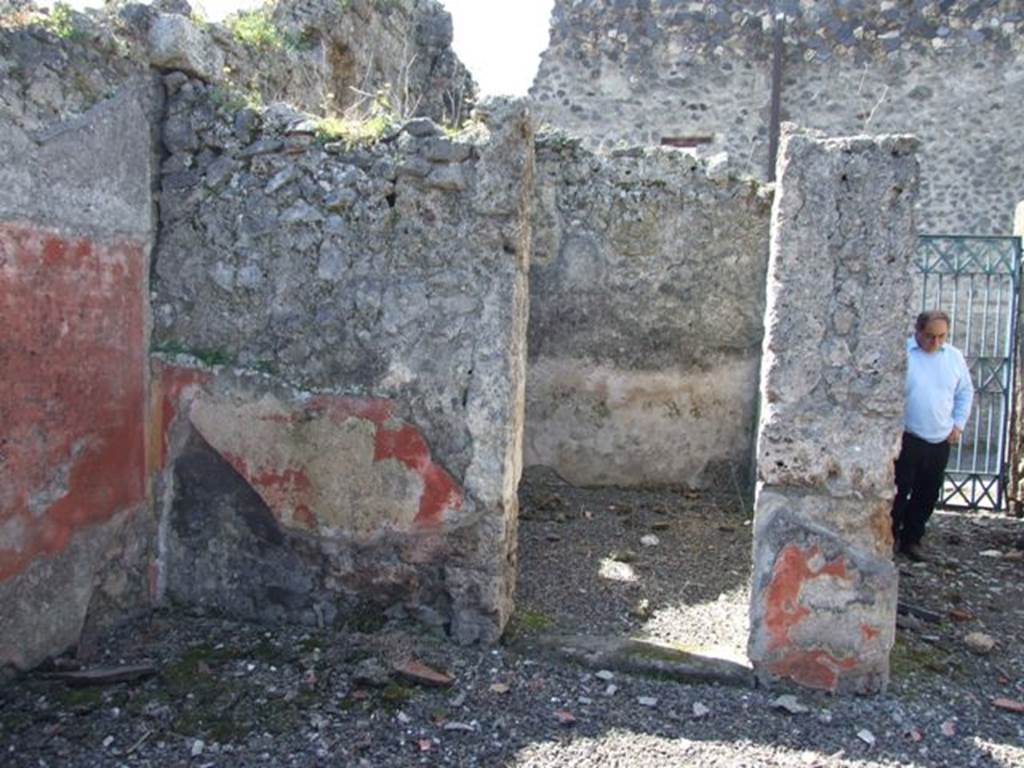 I.12.16 Pompeii.  March 2009.  Doorway to room 7 in south west corner of atrium.