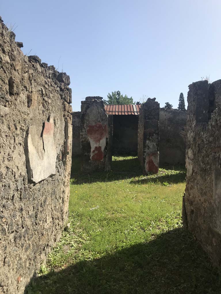 I.12.16 Pompeii. April 2019. Looking east from entrance doorway.
Photo courtesy of Rick Bauer.
