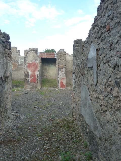 I.12.16 Pompeii.  March 2009.  Room 1.  Atrium.  North west corner, with doorway to Room 2.