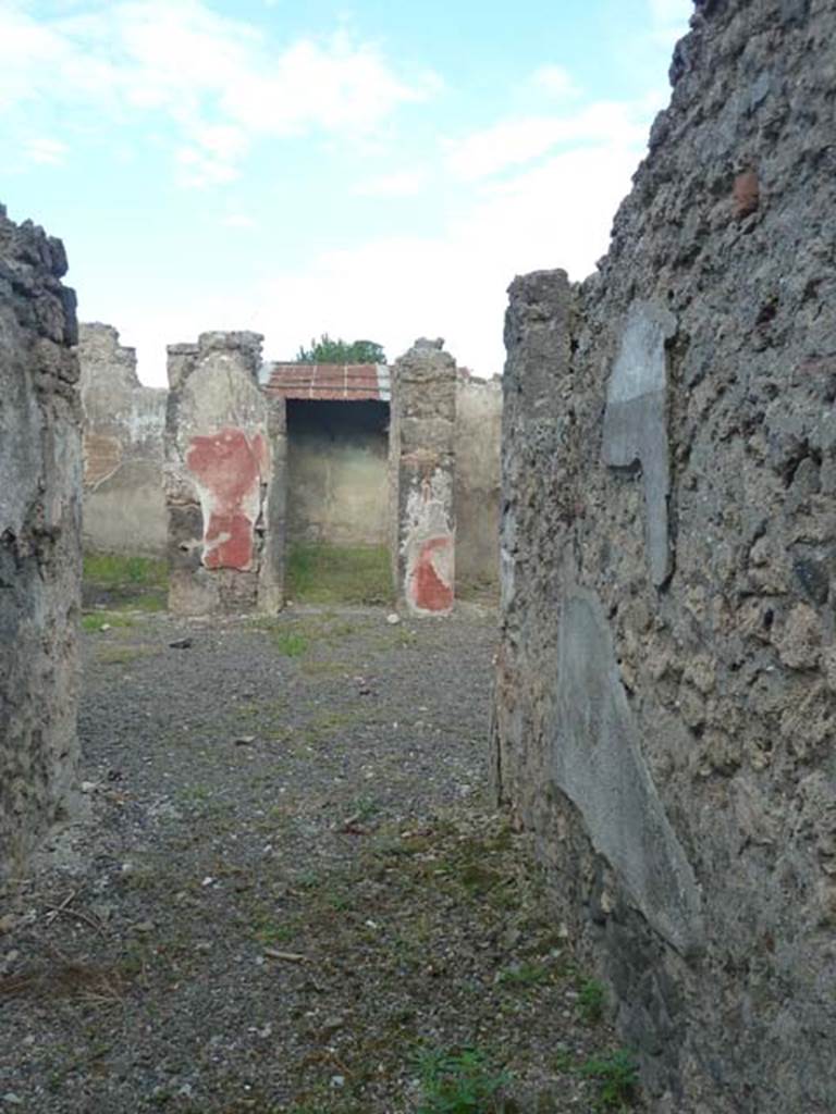 I.12.16 Pompeii. September 2015. Looking east from entrance doorway.