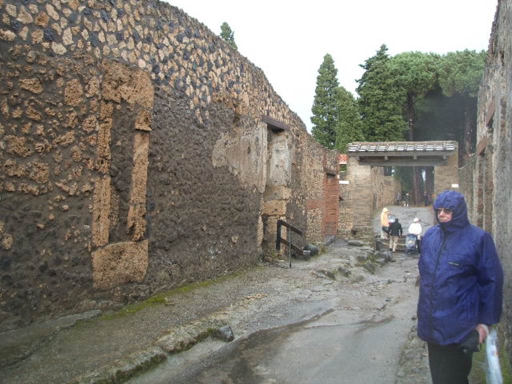 I.13 Pompeii. December 2004. Via di Castricio looking east to the Palaestra from outside 1.14.7.