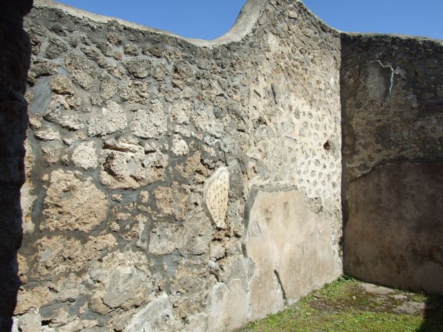 I.13.15 Pompeii. March 2009.  Room on north east side of central courtyard.  North east corner and north wall.