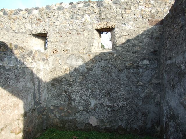 I.14.4 Pompeii. December 2007. Room 5, room at west end of north wall with oven.   