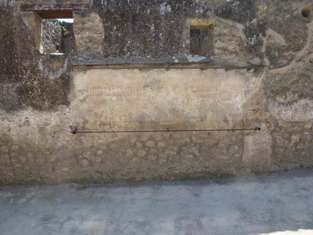 1.14.7 Pompeii. June 2012. Graffiti on exterior front faade between I.14.7 and I.14.8.
Photo courtesy of Michael Binns.
