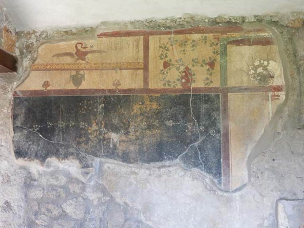 I.14.12, Pompeii. May 2018. Room 3, detail from south wall at east end. Photo courtesy of Buzz Ferebee.