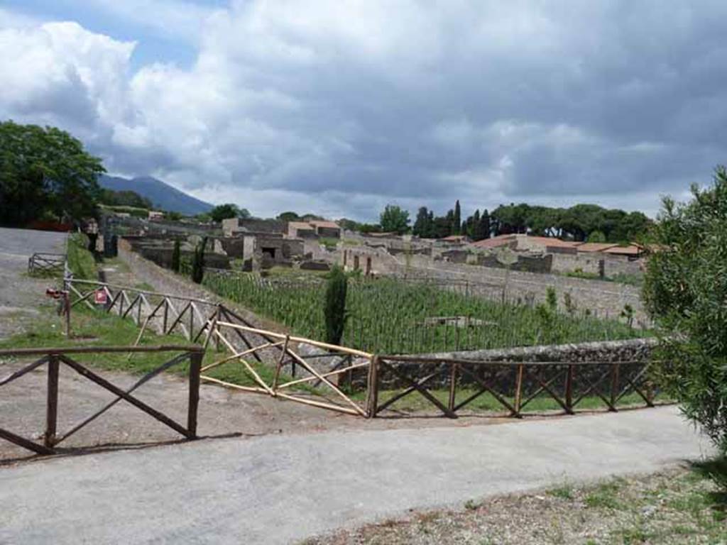 I.22 Pompeii. May 2010. Looking north-east across insula, from rear of I.22.1. 2 and 3.