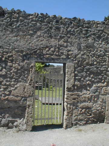 II.1.8 Pompeii. May 2005. Looking north across garden from doorway.
