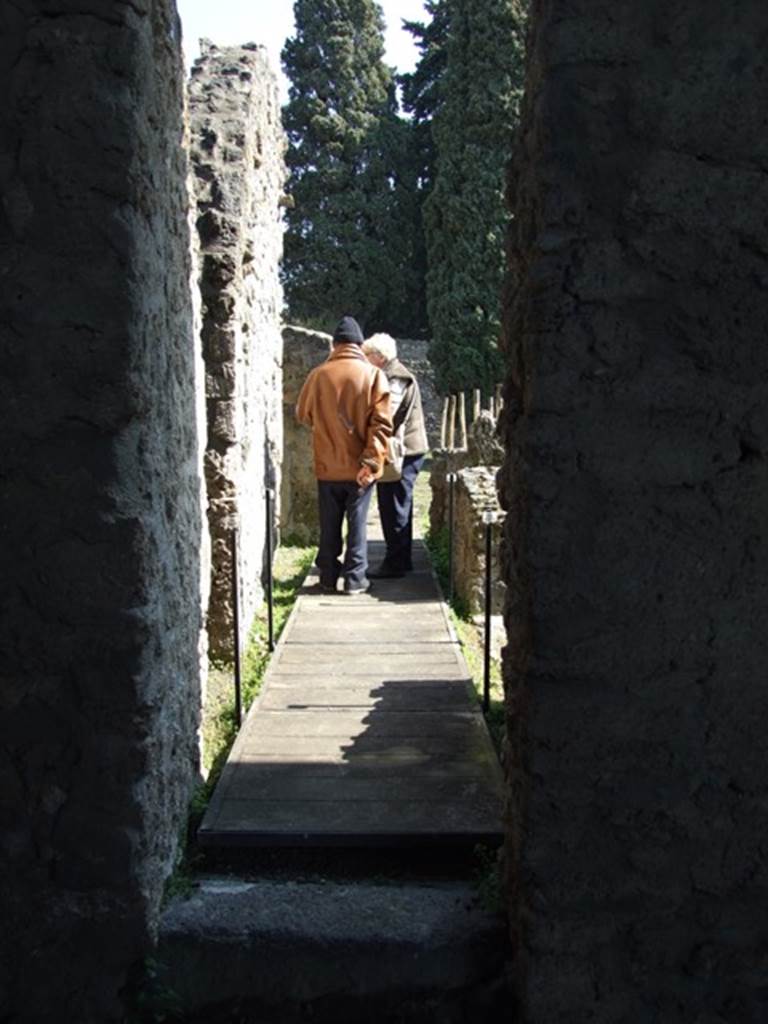 II.1.9 Pompeii.  March 2009.  Corridor leading to rear.