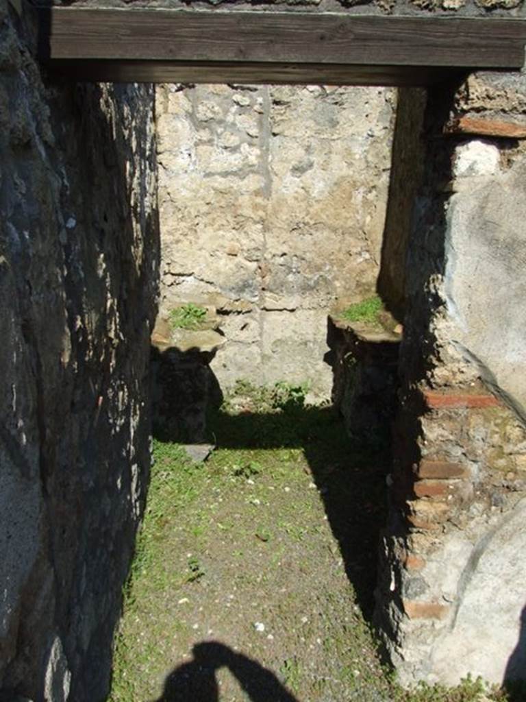 II.1.9 Pompeii. March 2009. Doorway to room 6, kitchen, and/or latrine.